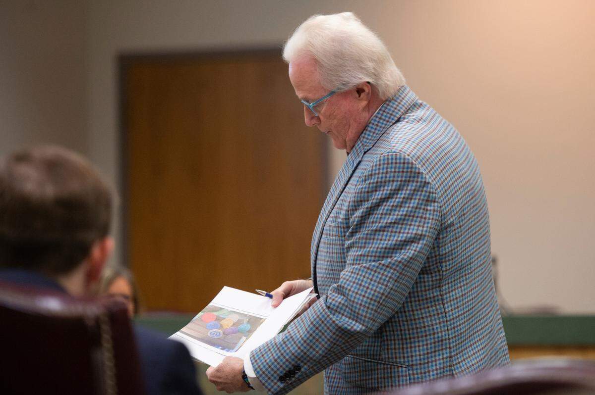 Attorney Jim Davis shows an image of Joseph Leo Nangle’s sobriety chips to the prosecution during Nangle’s sentencing in Jackson County Circuit Court in Pascagoula on Tuesday, Oct. 22, 2024.