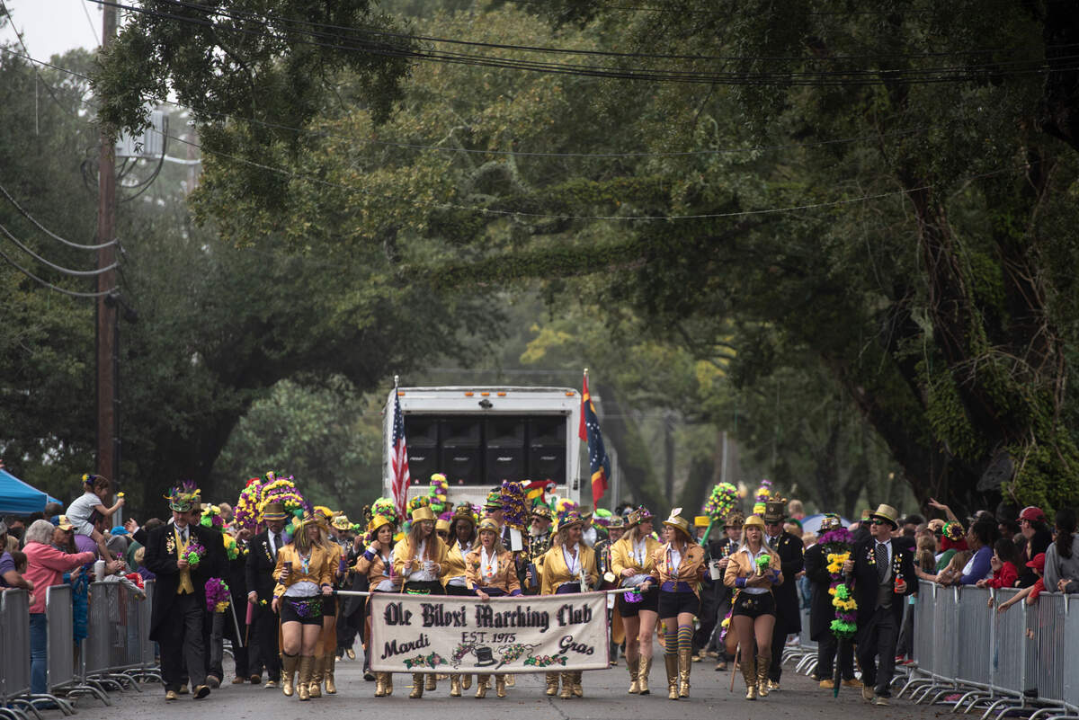 The Ole Biloxi Marching Club marches in the Ocean Springs Elks Carnival Parade in downtown Ocean Springs on Saturday, Jan. 27, 2024.