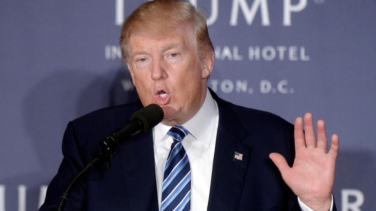 Republican presidential nominee Donald Trump speaks on October 26, 2016, in Washington, D.C. He will seek to govern an increasingly divided nation.