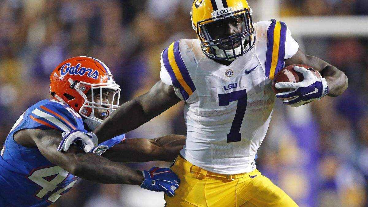 GERALD HERBERT/ASSOCIATED PRESS 
 LSU running back Leonard Fournette (7) carries against Florida defensive back Keanu Neal (42) in the second half of an NCAA college football game in Baton Rouge, La., Saturday, Oct. 17, 2015. LSU won 35-28.