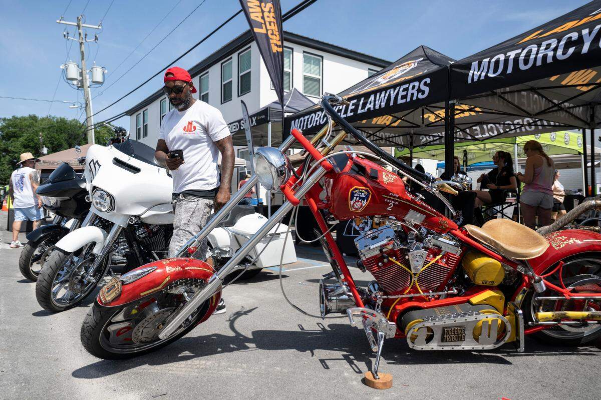 Motorcycle lovers walk among motorcycles and vendors at Bikin’ The Beach in Biloxi on Friday, June 6, 2025.