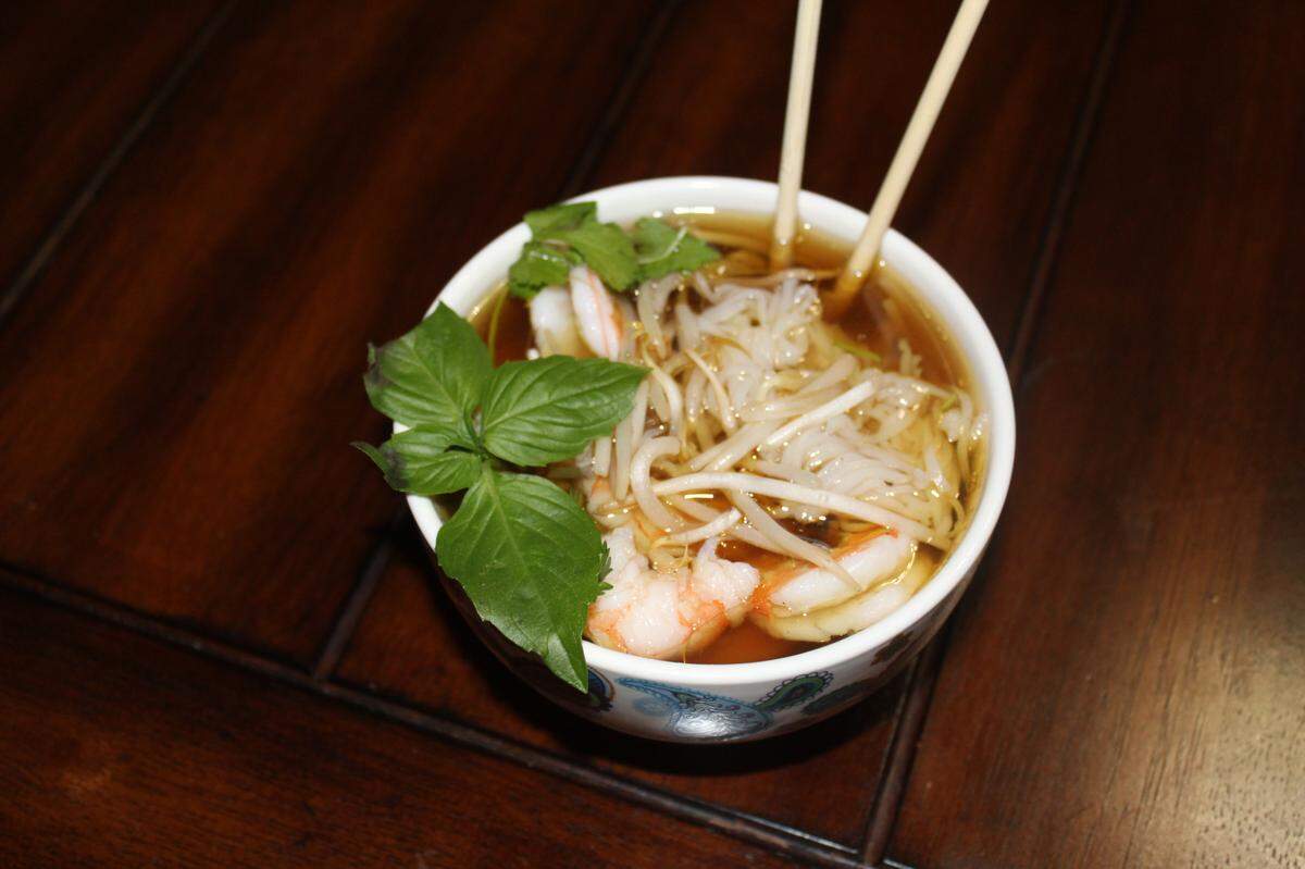 Pho broth can take anywhere from three to 12 hours to make, as beef or chicken bones simmer with aromatics like ginger, onions, cinnamon sticks, fish sauce, cloves and star anise to build a rich, layered flavor.