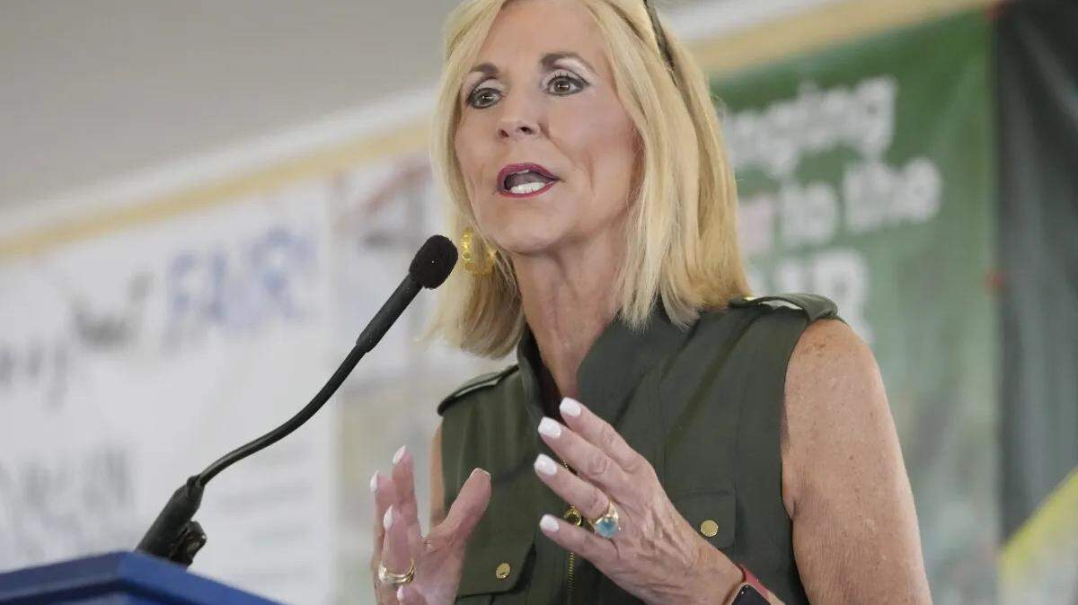 Mississippi Republican Attorney General Lynn Fitch addresses the crowd at the Neshoba County Fair in Philadelphia, Miss., earlier this year. Fitch seeks reelection in November