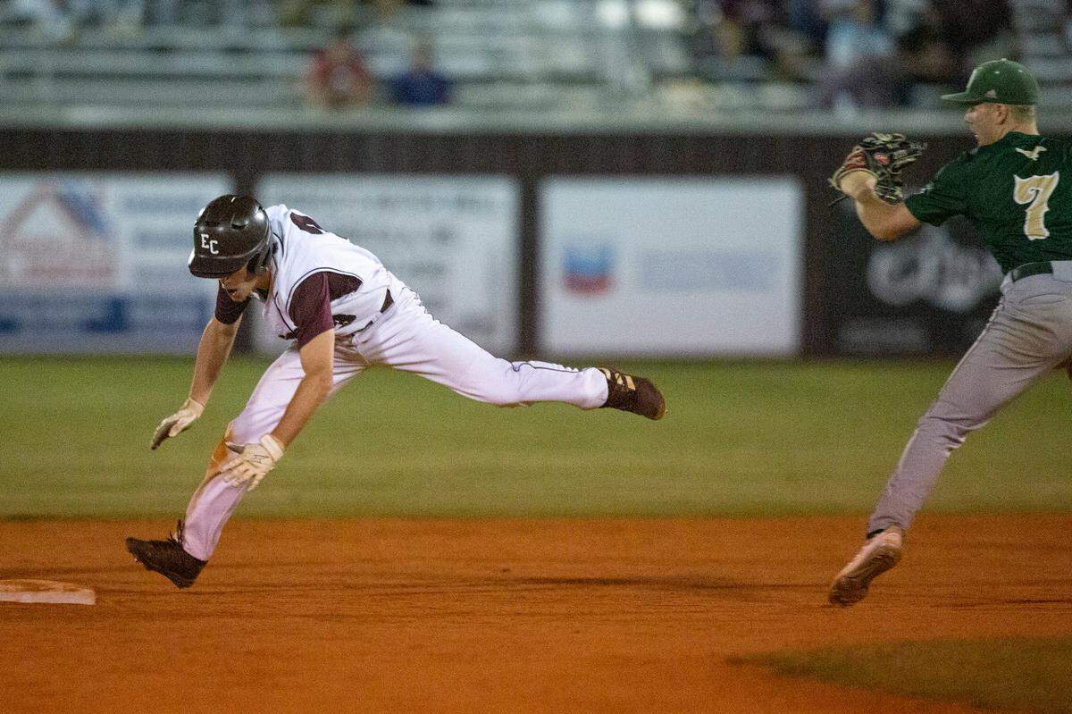 East Central’s Eli Smith makes it to second base after avoiding being tagged out during the 5A South State championship game at East Central High School in Hurley on Tuesday, May 23, 2023.