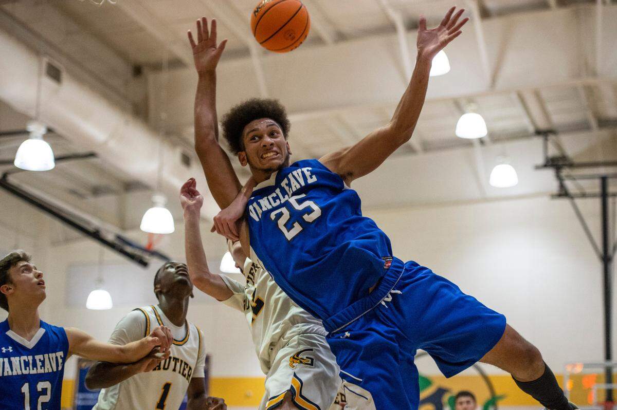 Vancleave forward Oscar Hampton gets blocked during a game against Gautier at Gautier High School in Gautier on Friday, Jan. 21, 2022.