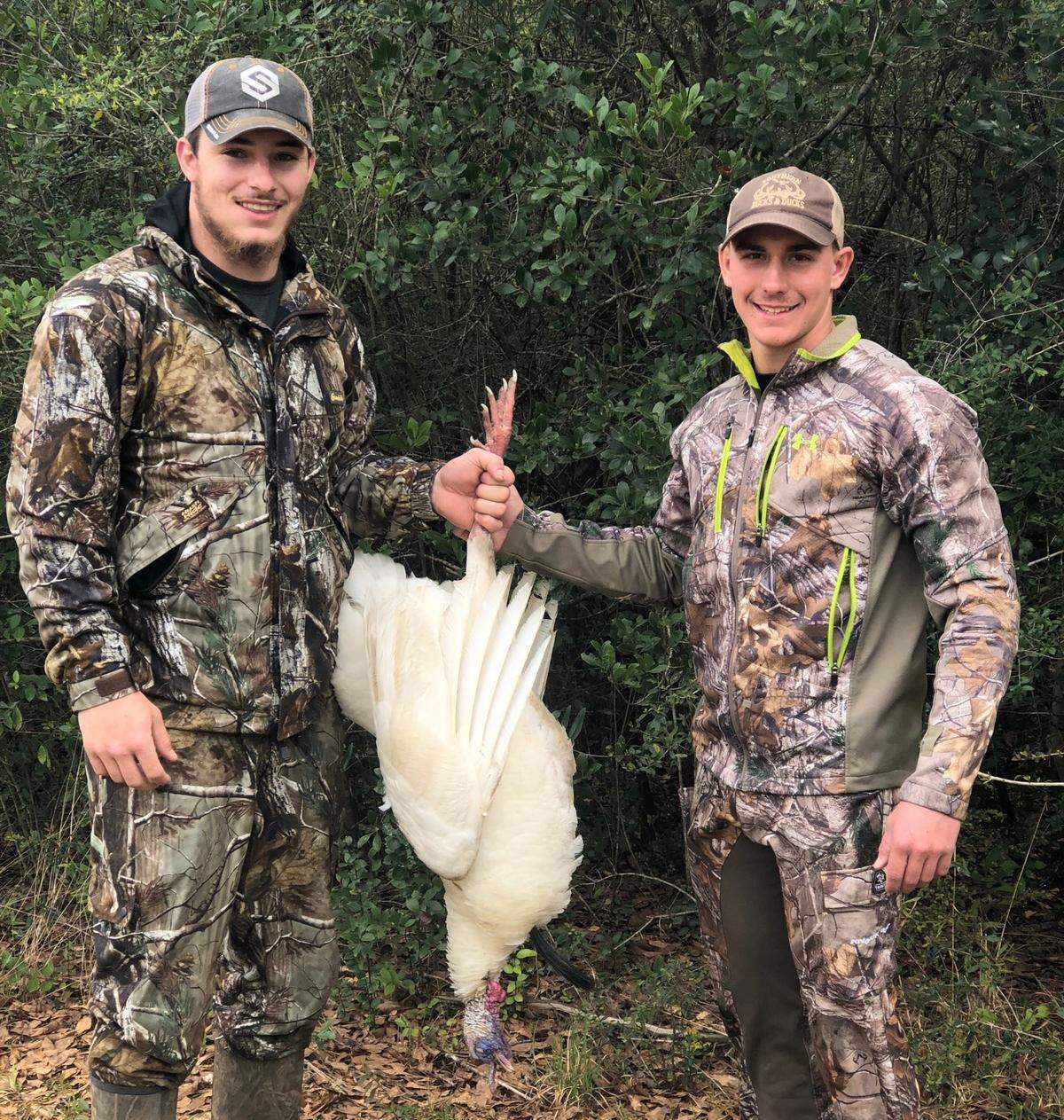 Hunter Waltman of Kiln and Toby Cagle of Saucier with the rare white turkey Waltman shot in Kiln, Mississippi, on March 17, 2019.