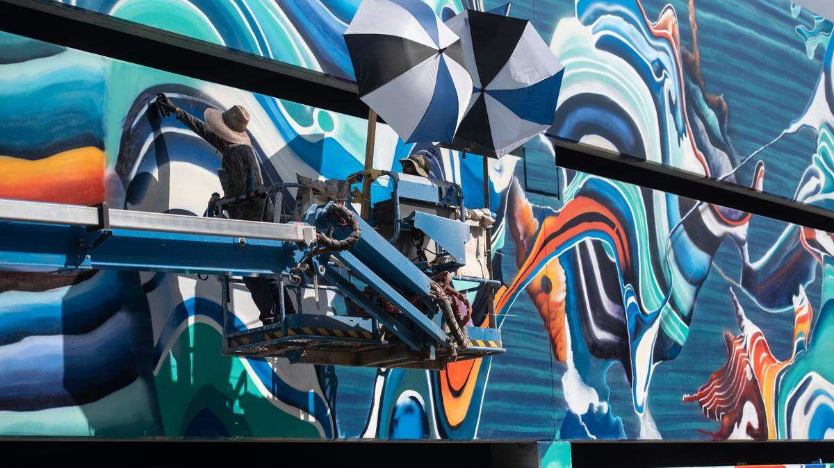 The parking garage at os1515 Downtown includes a colorful mural by artist Douglas Hoekzema. The city received $8 million in state grant funds for the project, which includes free public parking. 