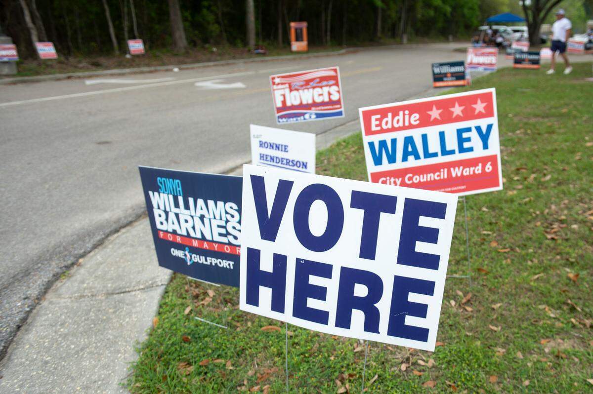 Voting signs outside a polling place at Orange Grove Community Center in Gulfport on Tuesday, April 1, 2025.