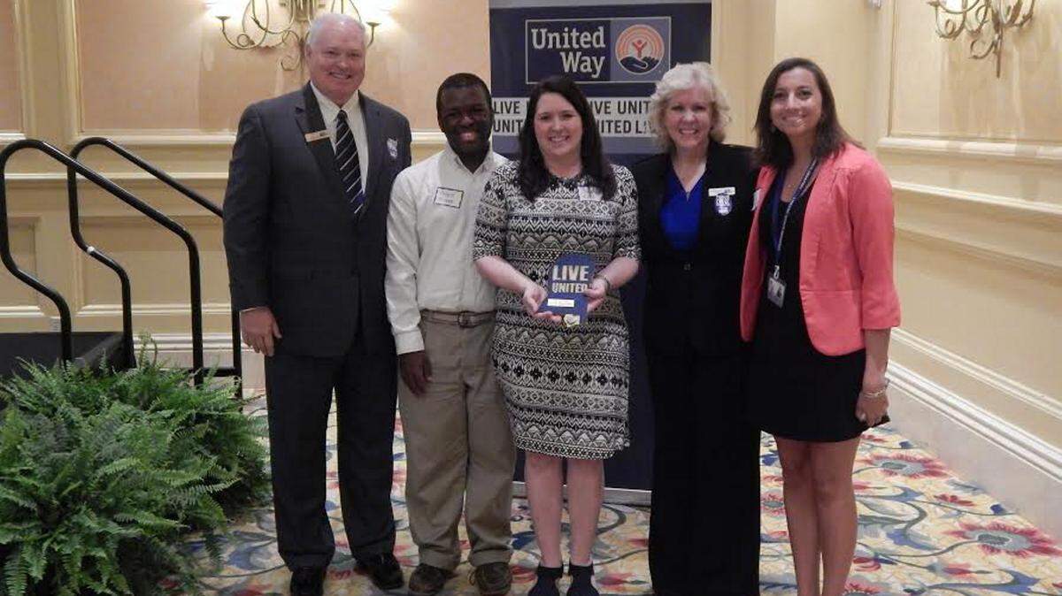 UNITED WAY OF SOUTH MISSISSIPPI 
 United Way of South Mississippi presented the Gulfport School District with the 2015 Spirit Award during the LIVE UNITED awards Monday, April 25, 2016, at the Beau Rivage Resort & Casino. From left are United Way 2015 Board President Ron Barnes, Gulfport High School's Bryce Moore and Sandy East, UWSM CEO Cynthia Minton Walker and MC Price with Gulfport High School.