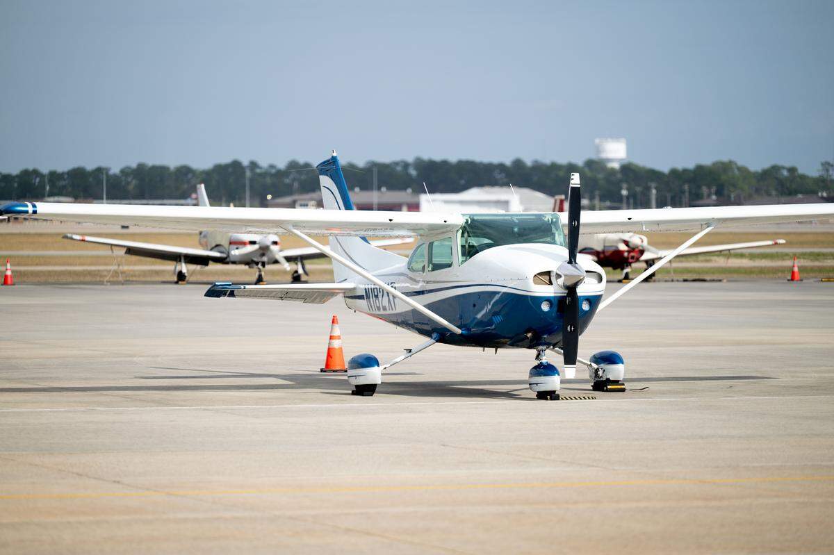 A plane sits on the landing strip Tuesday at Million Air terminal in Gulfport.