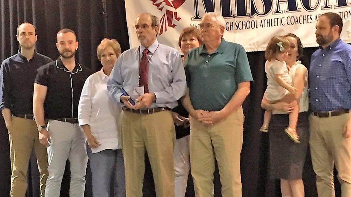 The family of the late Bernard Blackwell accepts an award inducting him into the National High School Atheltic Coaches Association Hall of Fame on June 30, 2018, in Sioux Falls, South Dakota.