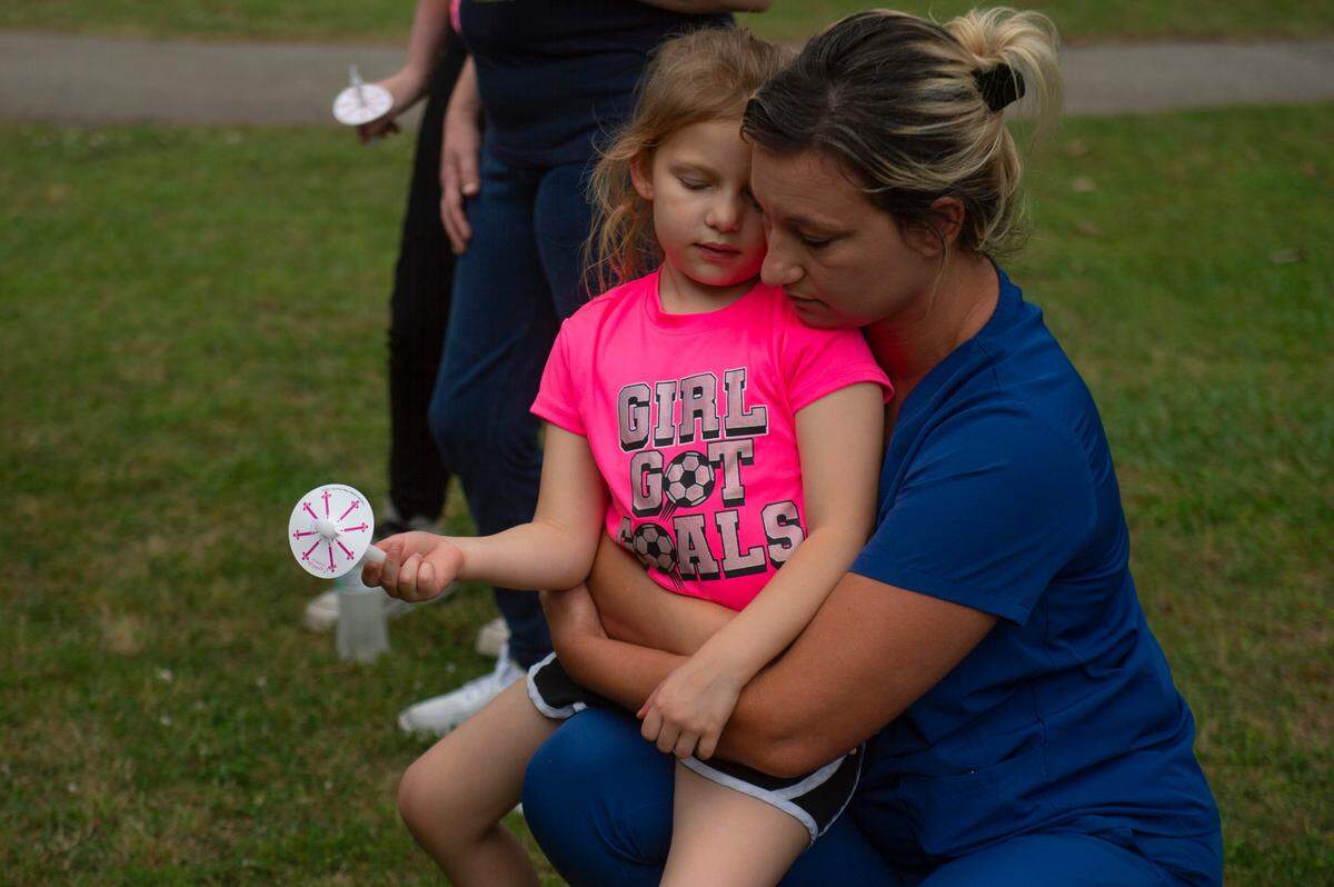 Community members remember 6-year-old Gracelynn Vick at a candlelight vigil in her honor at Saucier Park on Tuesday, April 22, 2025.