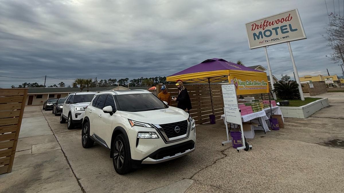 The King Cake Drive-Thru set up outside the Driftwood Motel in Bay St. Louis on Wednesday, Jan. 15, 2025.