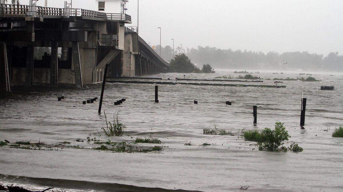 AMANDA McCOY/SUN HERALDHigh water surrounds the Popp's Ferry Bridge during Hurricane Isaac on Aug. 29, 2012, as the bridge in Biloxi is closed. Part of the funding for a new bridge could be redirected under a federal program.