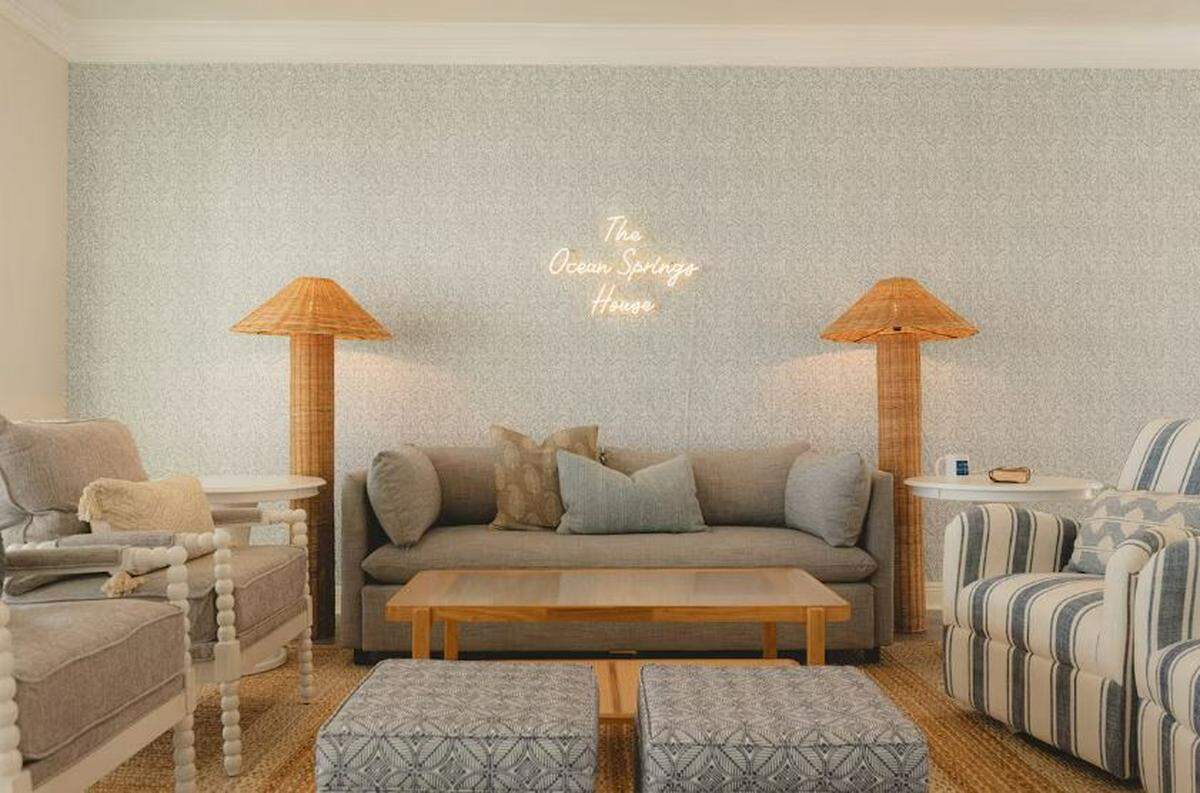 A West Elm sleeper sofa raises the number of guests the three-bedroom home accommodates to eight.