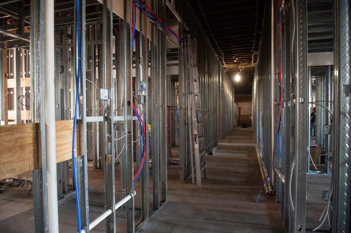 A hallway is framed between future apartments in the Barq Building in downtown Biloxi.