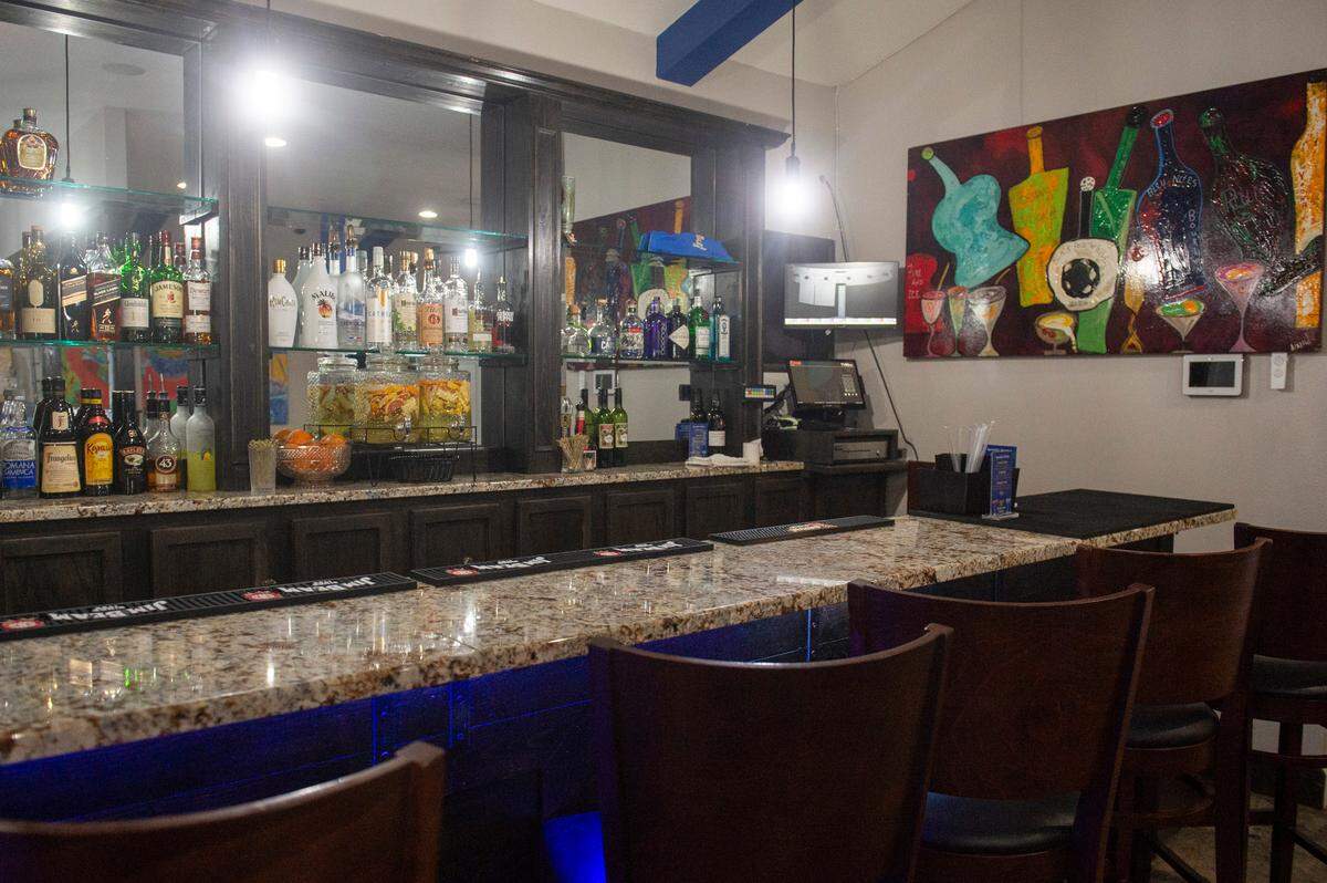 The bar is shown at the new 38 Degrees Family Style Dining in Ocean Springs.