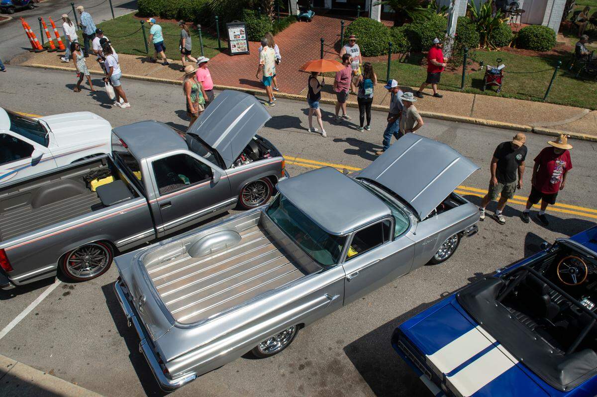 Cars parked along Lameuse Street during the Biloxi Block Party, a Cruisin’ The Coast event in Biloxi on Wednesday, Oct. 9, 2024.