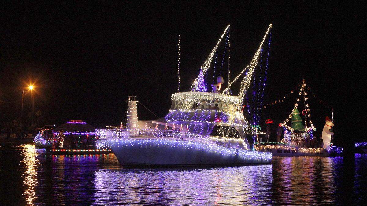 TIM ISBELL/SUN HERALDThe Southern Miss makes its way past The Dock Bar & Grill during Christmas on the Bayou boat parade, Saturday.
