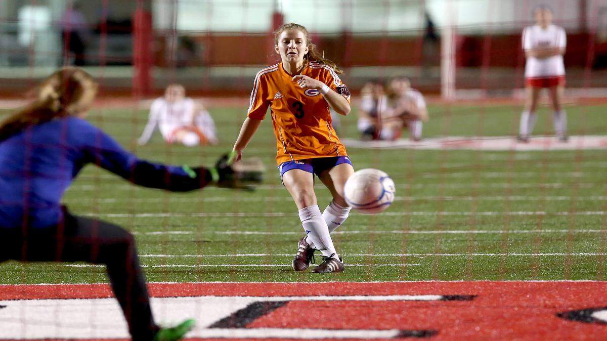 AMANDA McCOY/SUN HERALD 
 Gulfport's Megan Wadsworth scores a penalty kick against Biloxi on Tuesday, January 19, 2016. Gulfport defeated Biloxi 4-2 in penalty kicks.