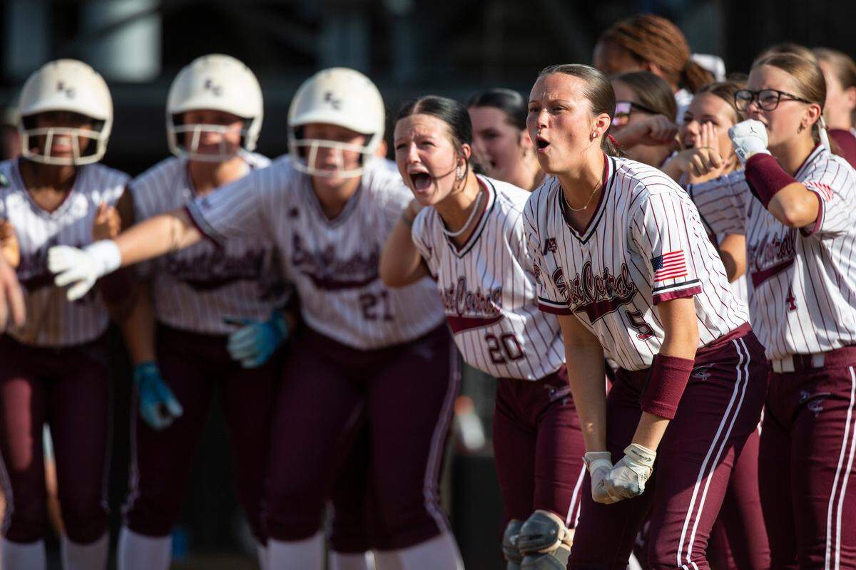 East Central players react as their teammates score during the MHSAA 5A Softball Championship at USM Softball Complex in Hattiesburg on Wednesday, May 14, 2025.