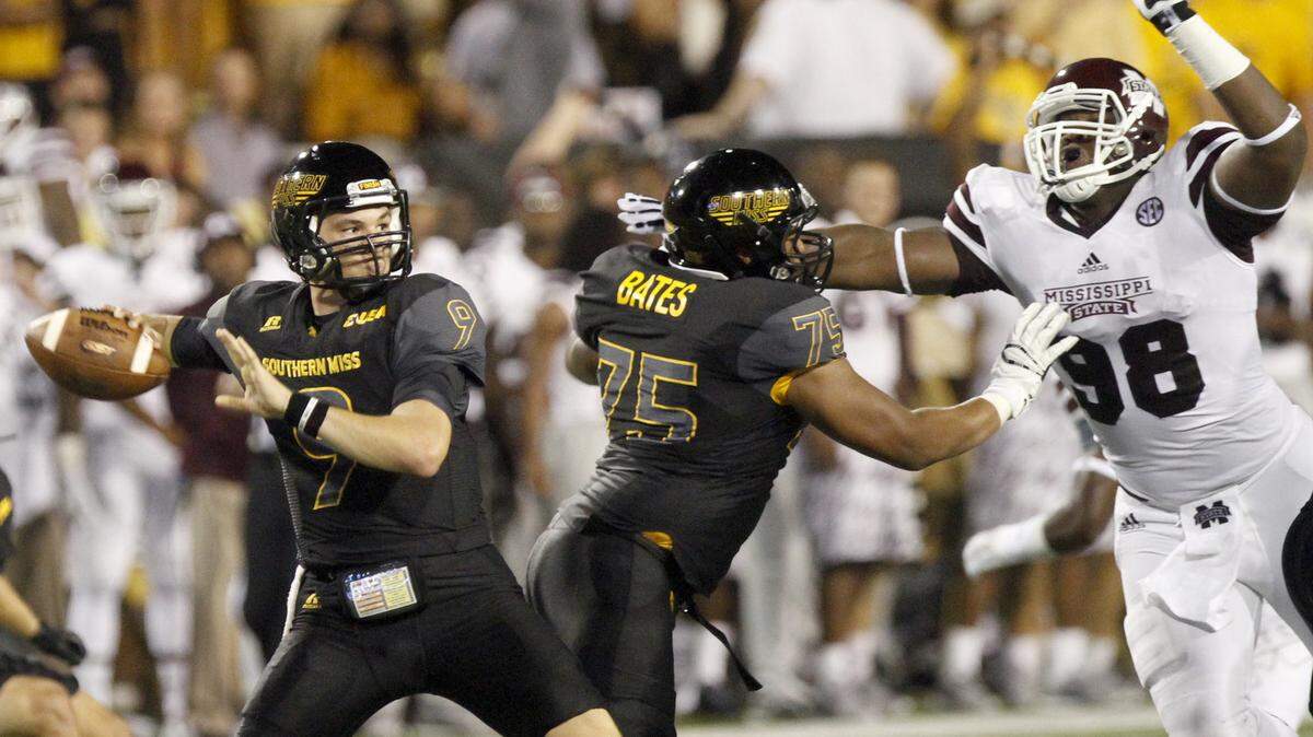TIM ISBELL/SUN HERALD 
 Mississippi State's Chris Jones pressures Southern Miss quarterback Nick Mullens during the 2015 season in Hattiesburg.