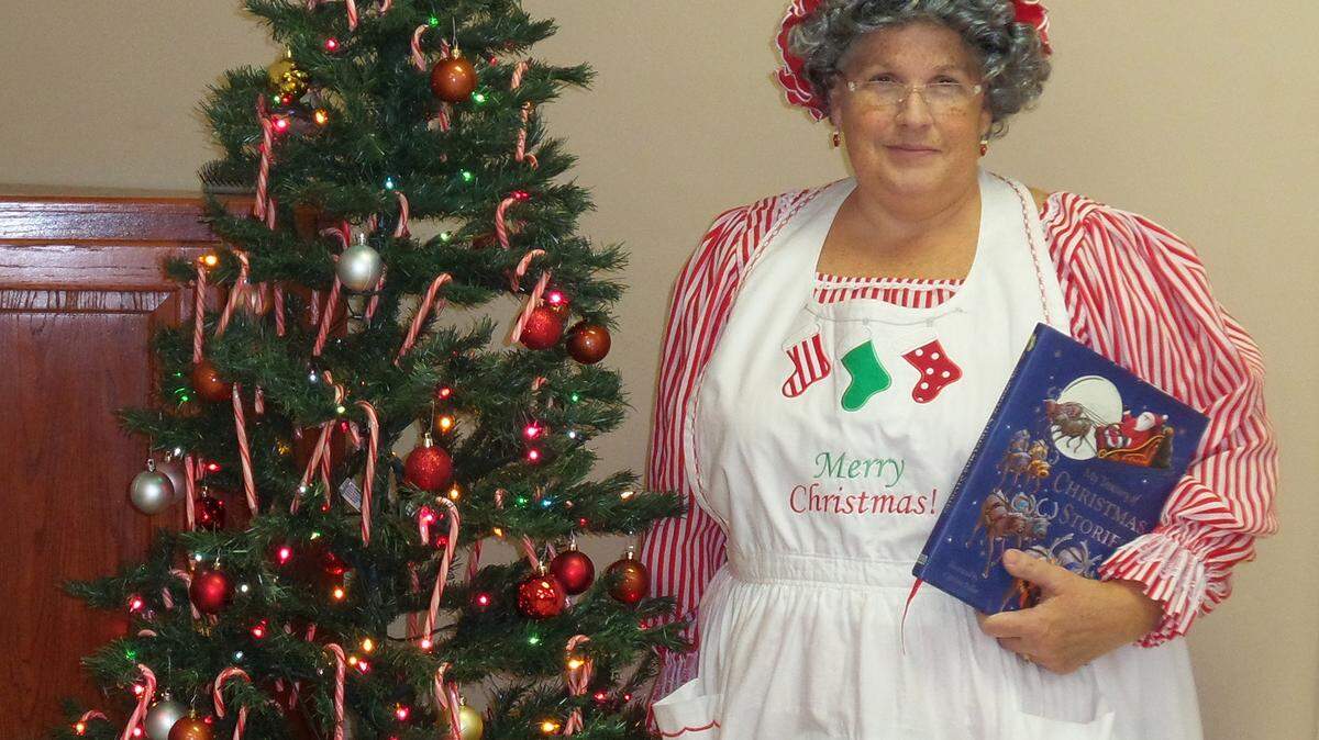 PHOTO COURTESY OF MONA FRANZENMona Franzen poses as Mrs. Claus at the Saucier Public Library.
