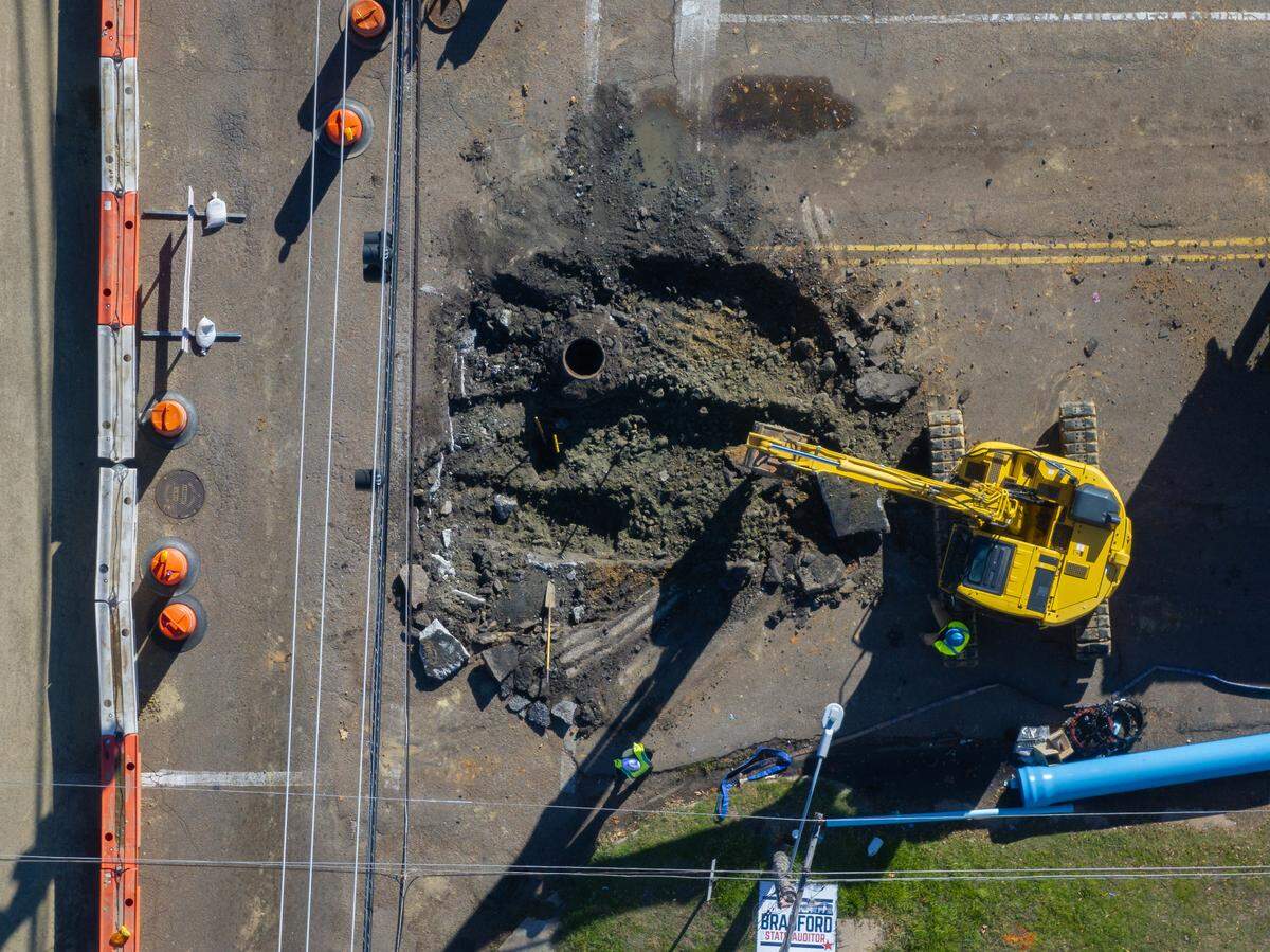 A city waterline construction site remains active in Jackson on Dec. 18, 2023.