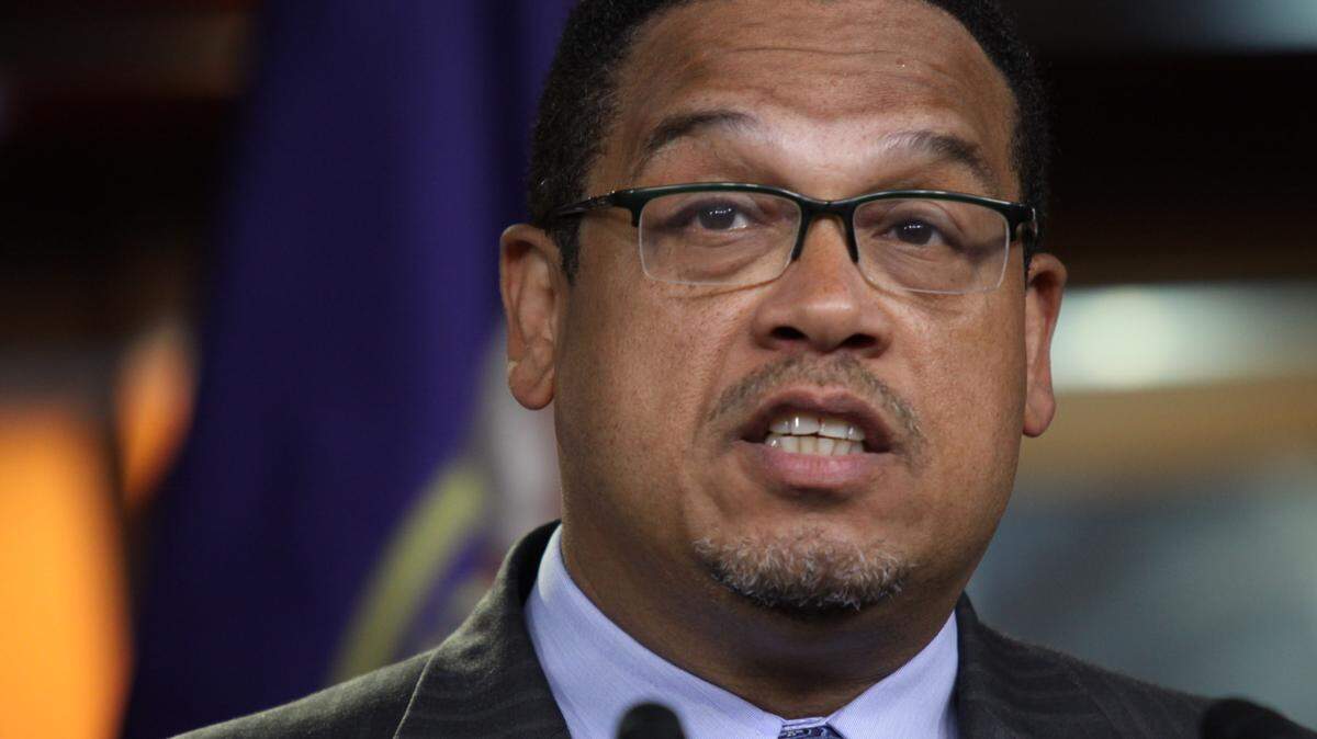 Rep. Keith Ellison, D-Minn., accompanied by fellow House Democrats, gestures during a news conference on Capitol Hill in Washington, Tuesday, June 16, 2016, to discuss opposition to the President Barack Obama's trade deal. (AP Photo/Lauren Victoria Burke)