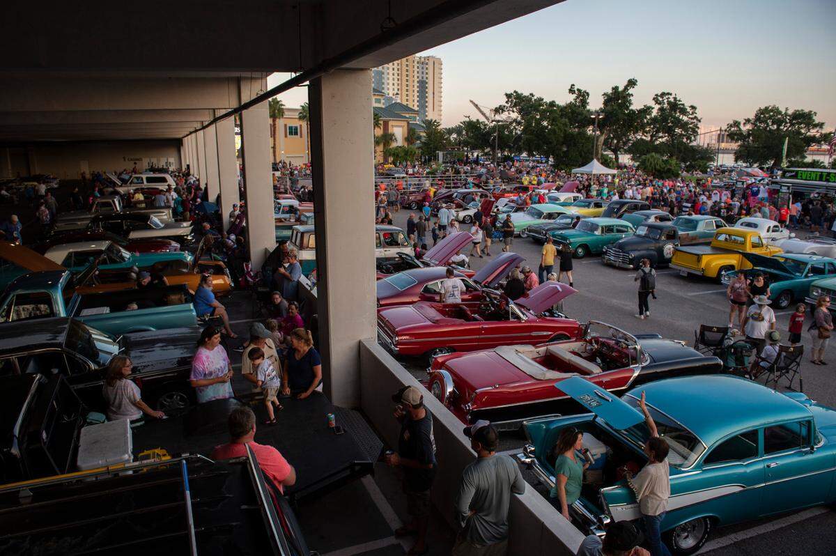 Classic cars fill the parking lot at Island View Casino in Gulfport for a flame throwing event during Cruisin’ The Coast 2021. The event is a huge economic boost to casinos, hotels, restaurants, stores and gas stations.
