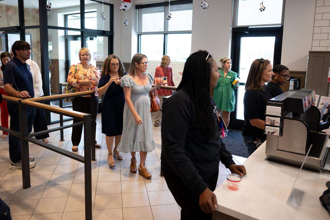 Customers line up to place an order during after the ribbon-cutting Wednesday at the new Chick-Fil-A in Ocean Springs.