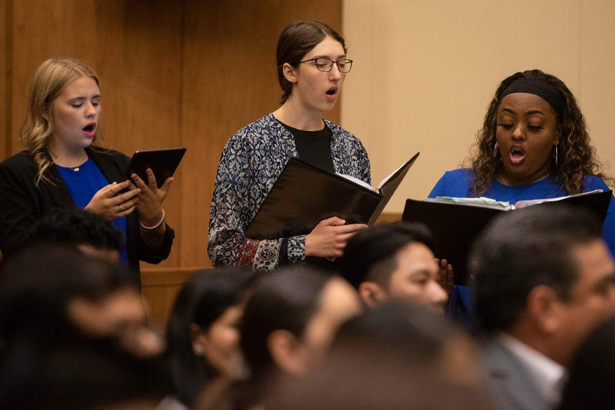 Carpenter’s Wood choir from William Carey University sings “America the Beautiful” during a naturalization ceremony at Dan M. Russell Jr. Federal Courthouse in Gulfport on Friday, Oct. 7, 2022.