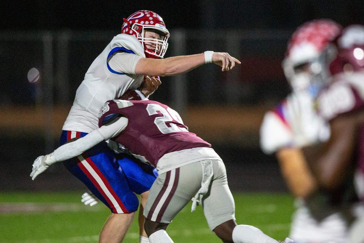 Pascagoula quarterback Silas Corder gets sacked by Picayune’s Amarion Tyson during a playoff game at Lee-Triplett Stadium in Picayune on Friday, Nov. 17, 2023.