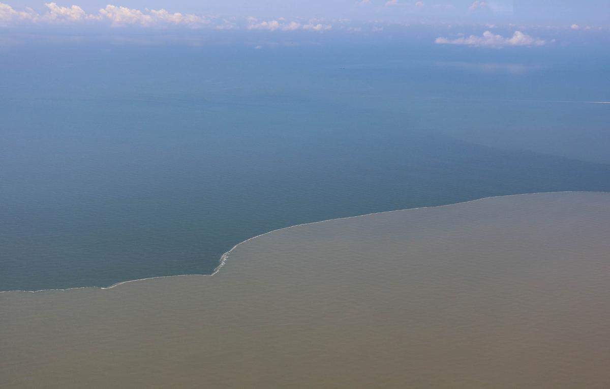 The Mississippi River meets the Gulf of Mexico south of Louisiana on June 7. The Gulf’s low-oxygen ‘dead zone,’ fueled largely by runoff from Midwest farms, is larger than average and larger than expected this summer.
