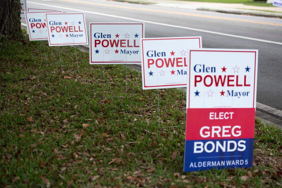 Signs supporting mayoral candidate Glen Powell outside a polling location at Grace Lutheran Church in Long Beach during the municipal primary election on Tuesday, April 1, 2025.