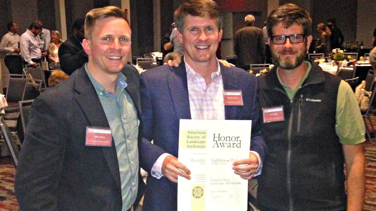 COURTESY CHRISTIAN PREUS LANDSCAPE 
 Oliver Preus, landscape architect; Christian Preus, founding principal, and Cory Gallo, campus planner, accept the Honor Award presented by Mississippi State University to Christian Preus Landscape Architect firm for the Lighthouse Project in Pascagoula.