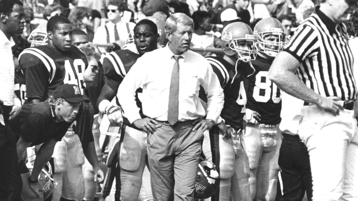 Ole Miss coach Billy Brewer patrols the sidelines during a game. Brewer, who coached 11 seasons from 1983 to 1994, died May 12, 2018.