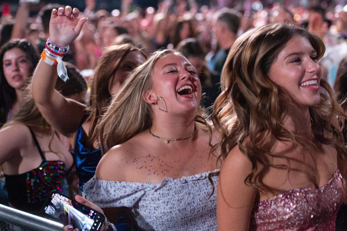 Fans cheer during Taylor Swift’s The Eras Tour at the Cesars Superdome in New Orleans on Friday, Oct. 25, 2024.