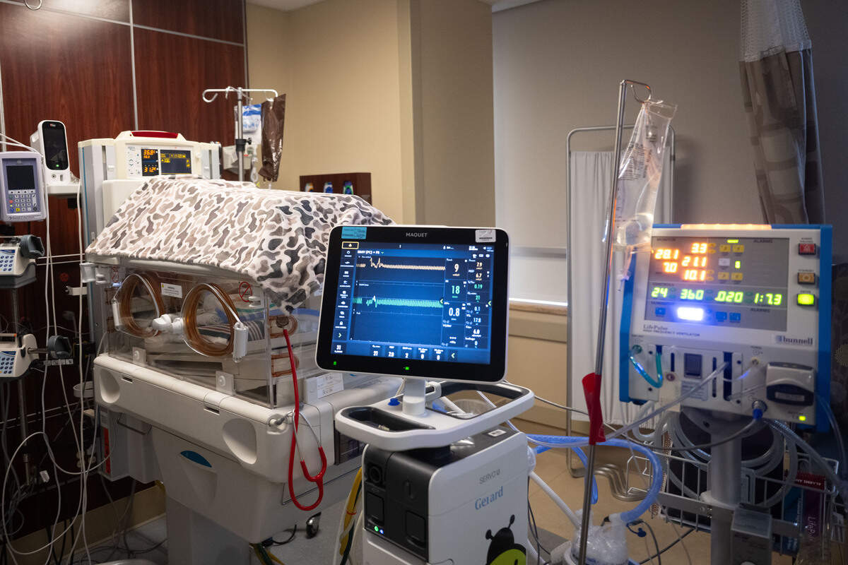 An infant sleeps in an OmniBed as several devices track its health at Neonatal Intensive Care Unit of Memorial Hospital Gulfport on Wednesday, Feb. 4, 2026.