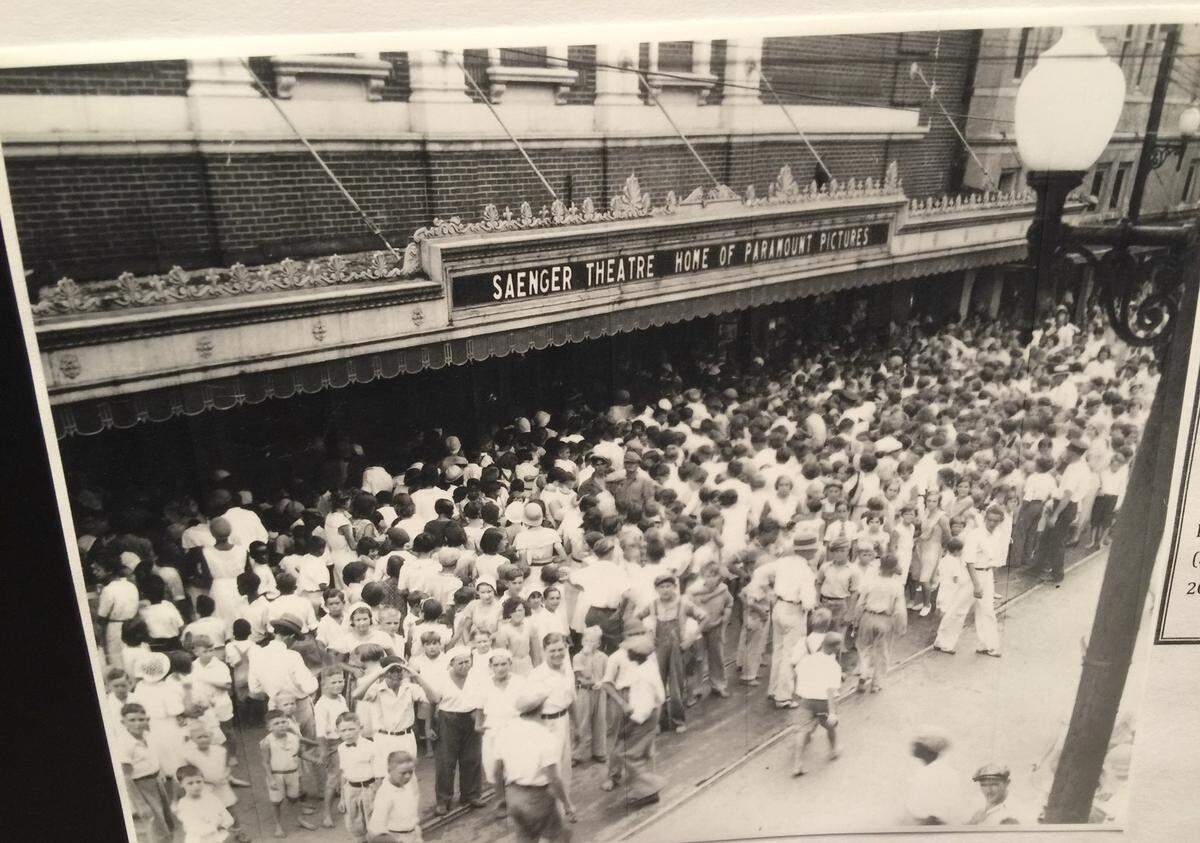 A photo of the opening day crowd at the Saenger Theatre on Jan. 15, 1929, was on display at the Biloxi Council meeting in 2019. A standing-room-only crowd attended the meeting to ask the city to help “Save Our Saenger.”