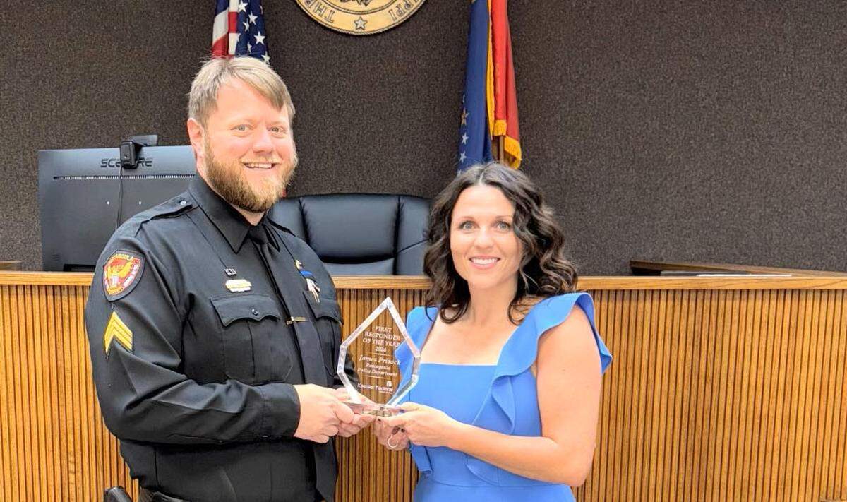 Photo Caption: (left to right) Pascagoula Police Department Officer James Prisock and Community Development Officer Samantha Bignell.&nbsp;