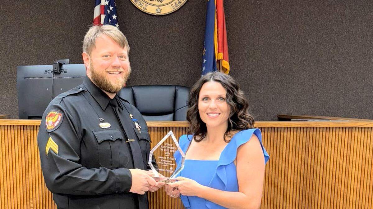 Photo Caption: (left to right) Pascagoula Police Department Officer James Prisock and Community Development Officer Samantha Bignell. 