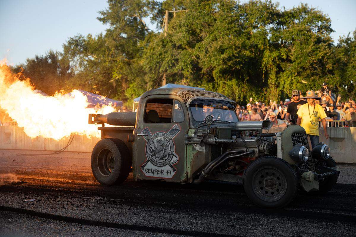 A modified vehicle shoots out fire during Burn ‘Em Up In The Pass on Thursday, Oct. 9, 2025.