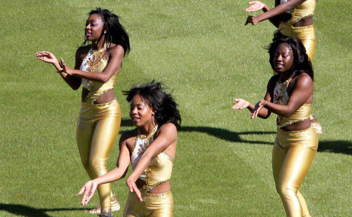 TIM ISBELL/SUN HERALDMembers of the Alcorn State dance team perform at MGM Park during MLK Day parade and Battle of the Bands, Monday, Jan. 18, 2016.