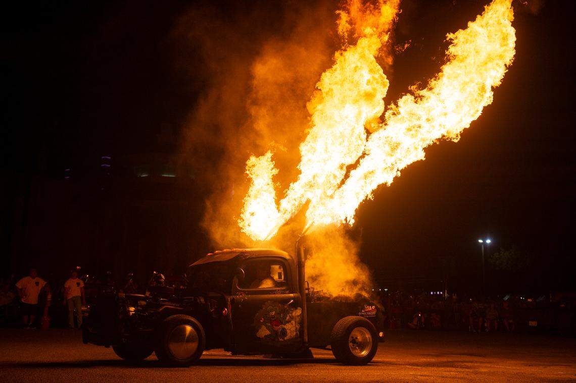 Kendal Boudreaux, of Grand Lake, LA, shoots flames out of his 1951 Ford Rat Rod during a flame throwing competition, where drivers compete to see which car can produce the biggest flames, at Island View Casino in Gulfport during Cruisin’ The Coast 2023.