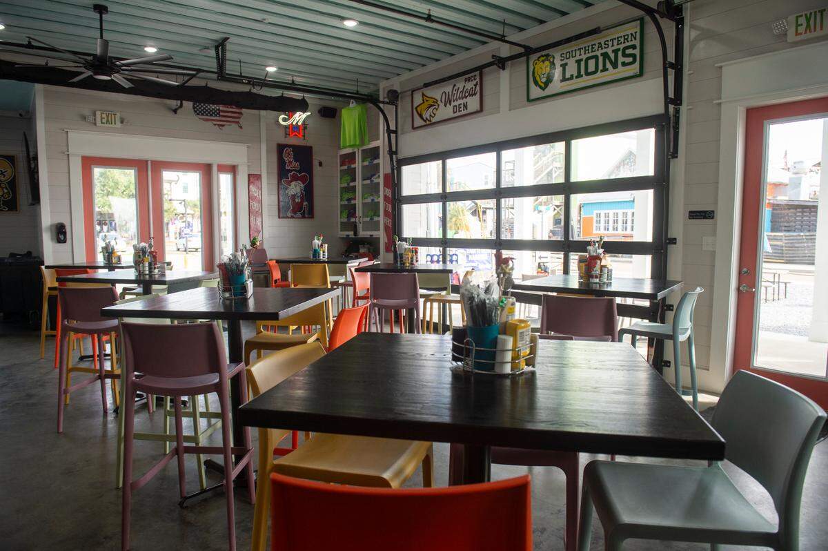 The first floor of Rags to Riches in Bay St. Louis on Thursday, Dec. 7, 2023. The two-story bar features a sports bar atmosphere on the first floor with bar food and a tropical cocktail menu.