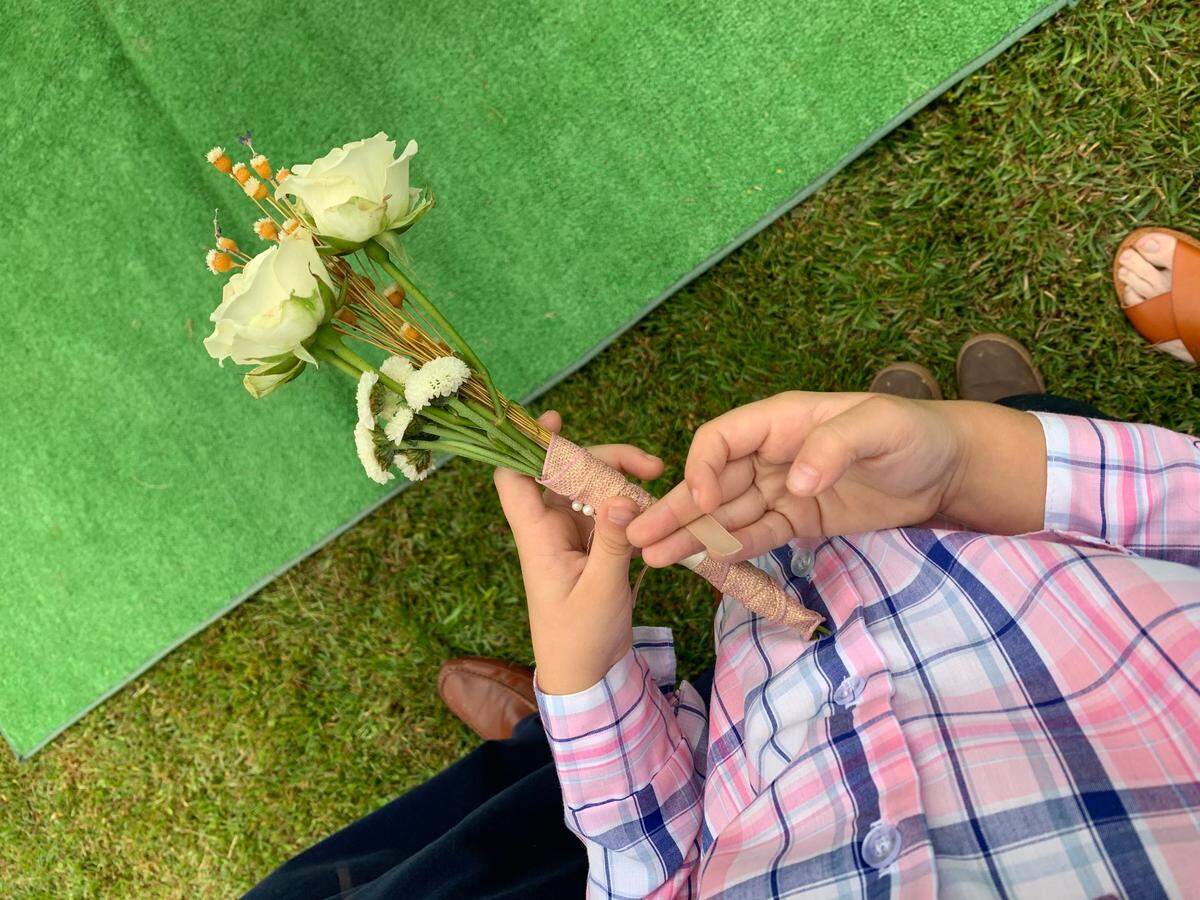 Charlie Clark at the burial of his grandmother, Cheryl Clark.