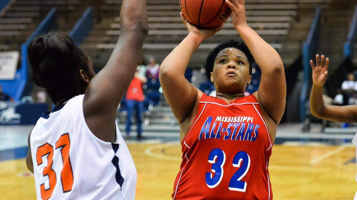 BOB SMITH/SPECIAL TO THE SUN HERALD 
 Harrison Central's De'Asia McInnis (32) shoots against Callaway during Girls MHSAA 6A Quarterfinal play at Jackson State University in Jackson.(Photo-Bob Smith)