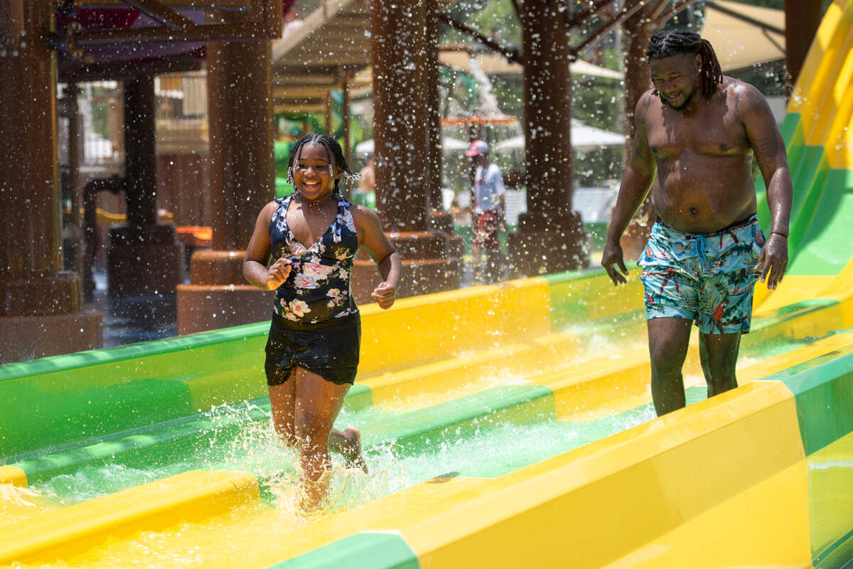 Guests play in the various water features at Serengeti Springs at the Hattiesburg Zoo, a new waterpark that opened in May, on Wednesday, June 5, 2024.