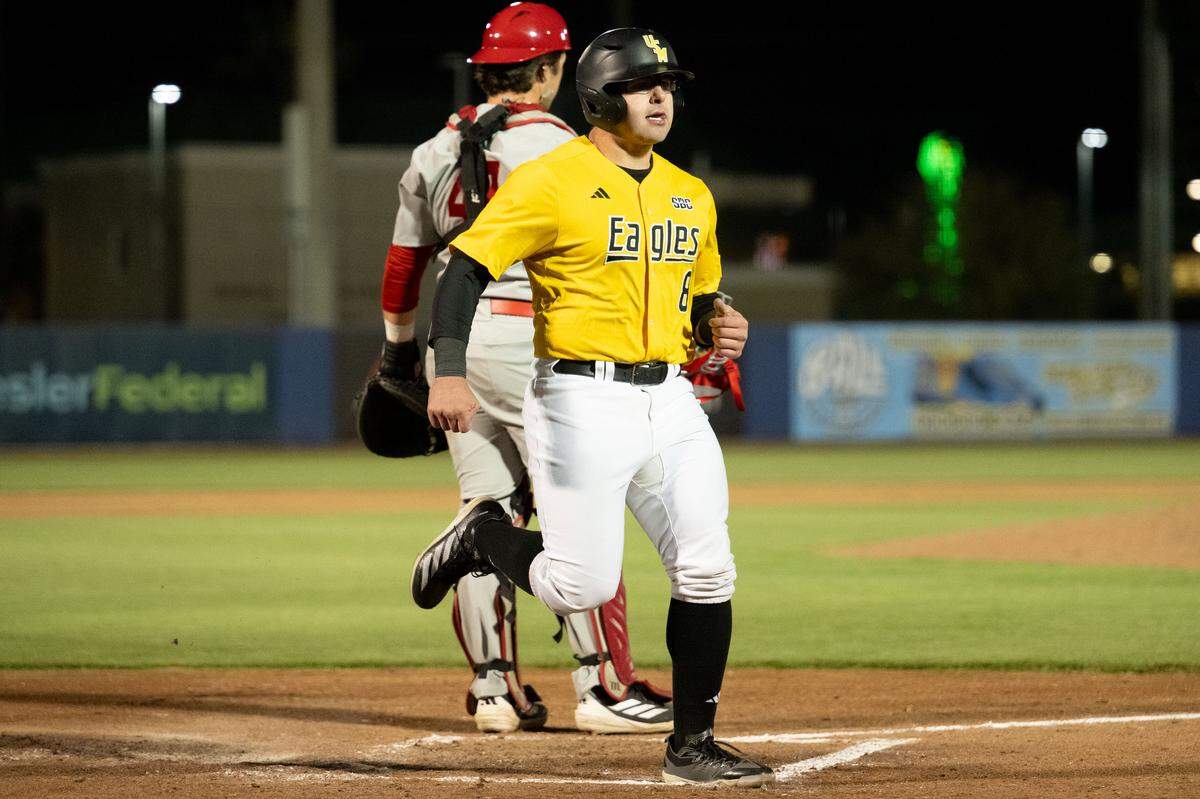 Southern Miss infielder Gray Eubanks (8) scores Tuesday against Nicholls.